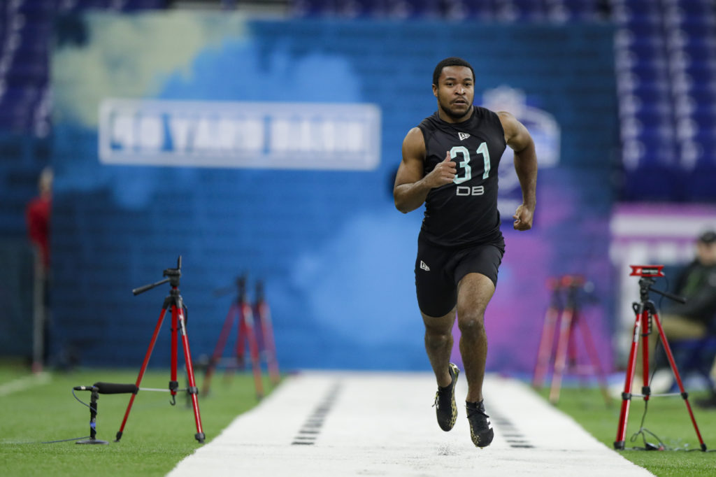 Michigan State defensive back Josiah Scott runs the 40-yard dash at the NFL football scouting combine in Indianapolis, Sunday, March 1, 2020. (AP Photo/Michael Conroy)